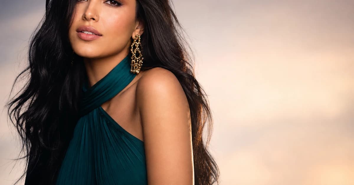 A woman with black hair wearing a saturated jewel-tone top, flattering colours for black hair, by ToneLala